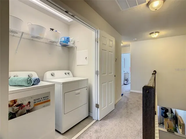 a spacious bedroom with a bed and a window