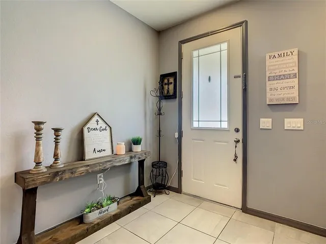 a room with gym equipment and a large mirror