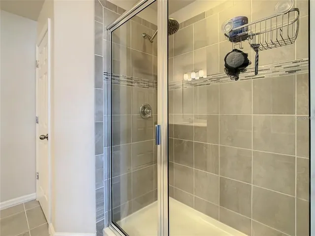 an aerial view of a house with garden space and houses