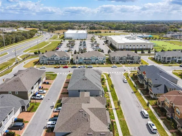 a view of a swimming pool and an outdoor seating