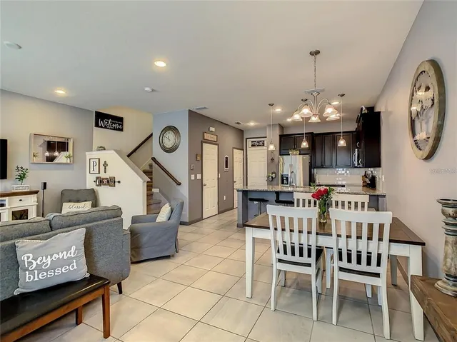 a view of a livingroom with furniture and a chandelier