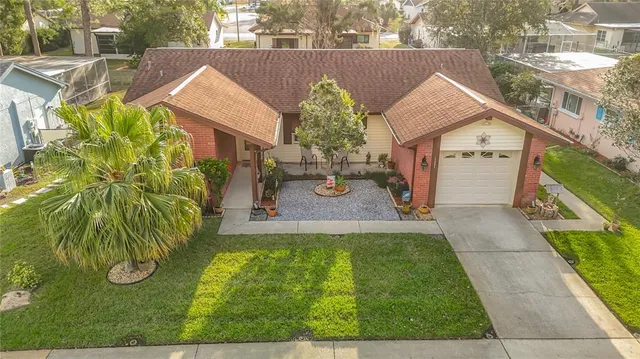 a view of house with garden