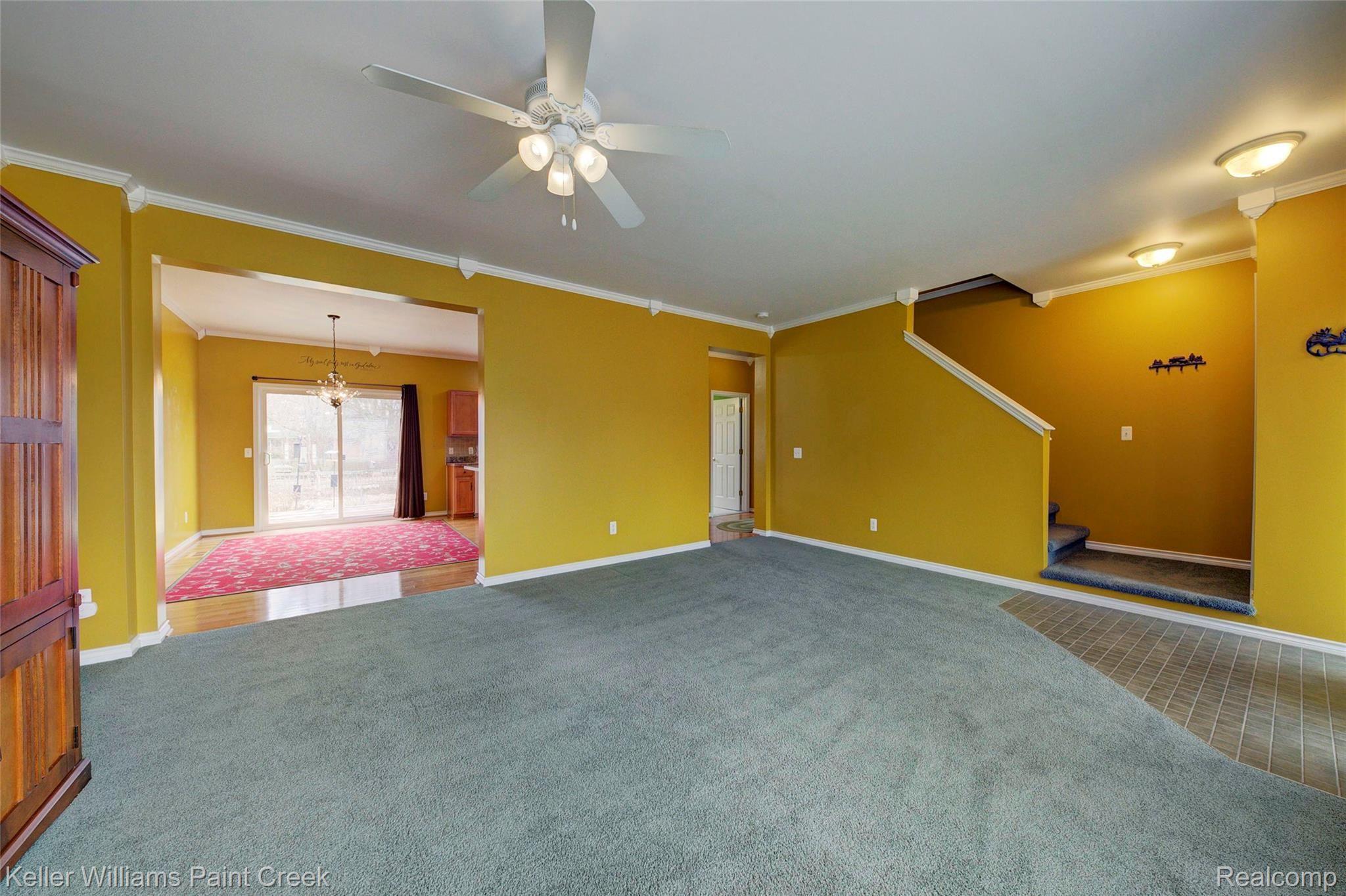 2263 East Maple Road Troy, MI 48083 - Photo 11 of 54 Great room & view of dining area