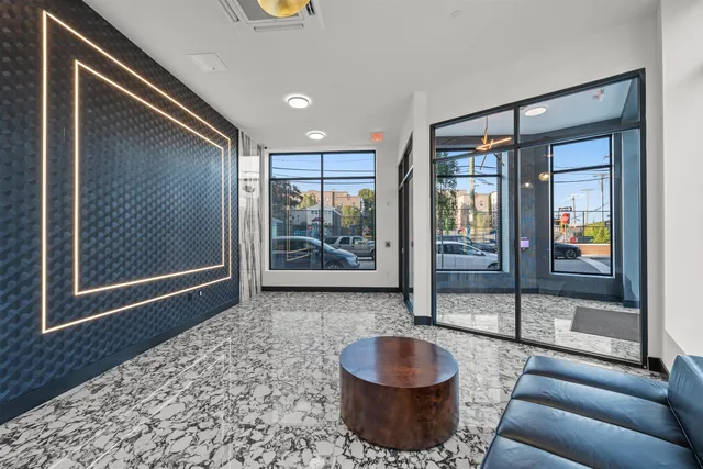 a living room with furniture and a gate