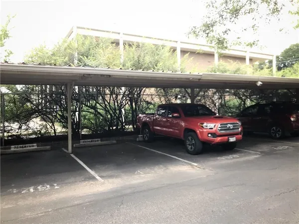 a view of car parked in city street