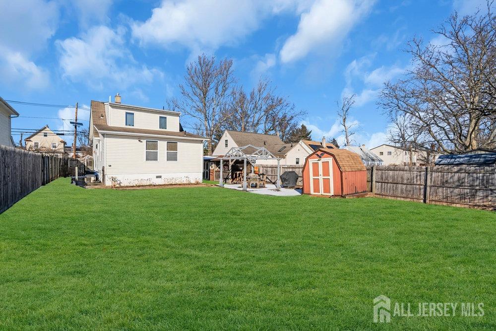 720 Voorhees Avenue Middlesex, NJ 08846 - Photo 22 of 28 a view of a house with backyard and garden