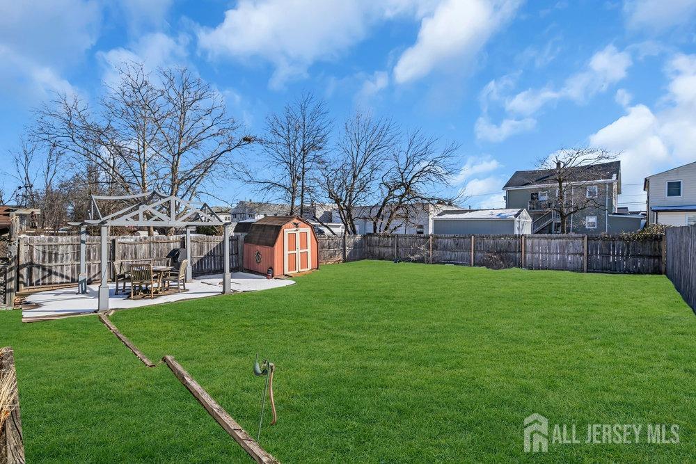 720 Voorhees Avenue Middlesex, NJ 08846 - Photo 24 of 28 a view of a house with a yard