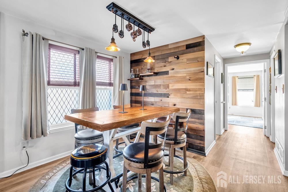 720 Voorhees Avenue Middlesex, NJ 08846 - Photo 9 of 28 a view of a dining room with furniture and wooden floor