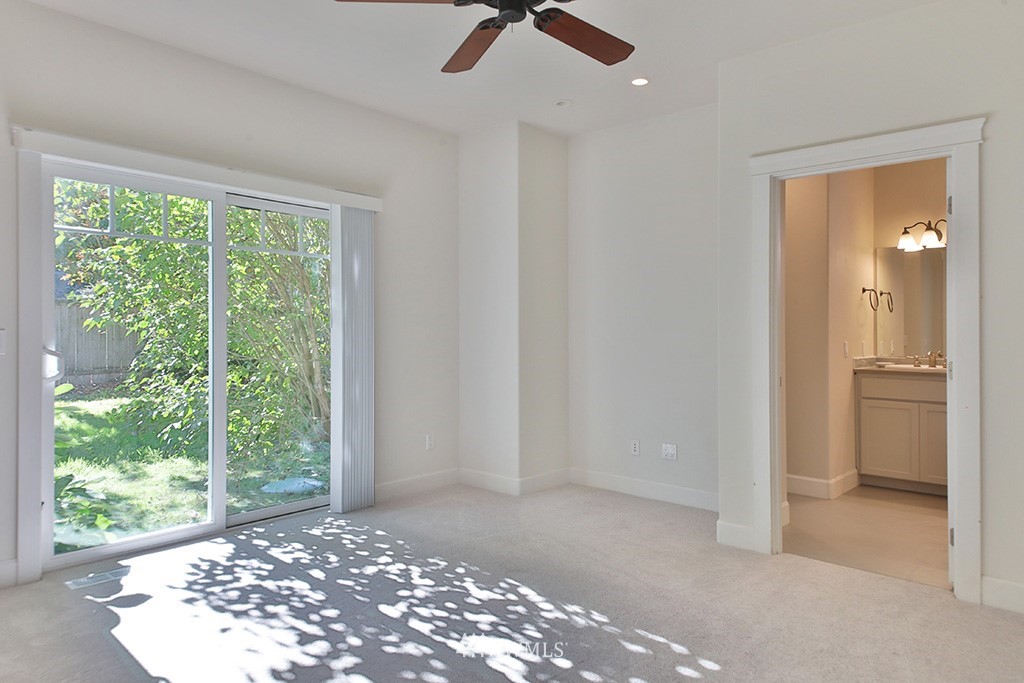 1822 East Watkins Road Freeland, WA 98249 - Photo 12 of 25 a view of an empty room with a window