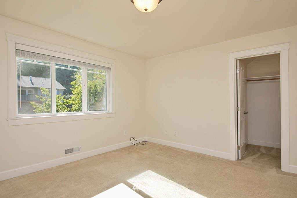 1822 East Watkins Road Freeland, WA 98249 - Photo 16 of 25 an empty room with a window
