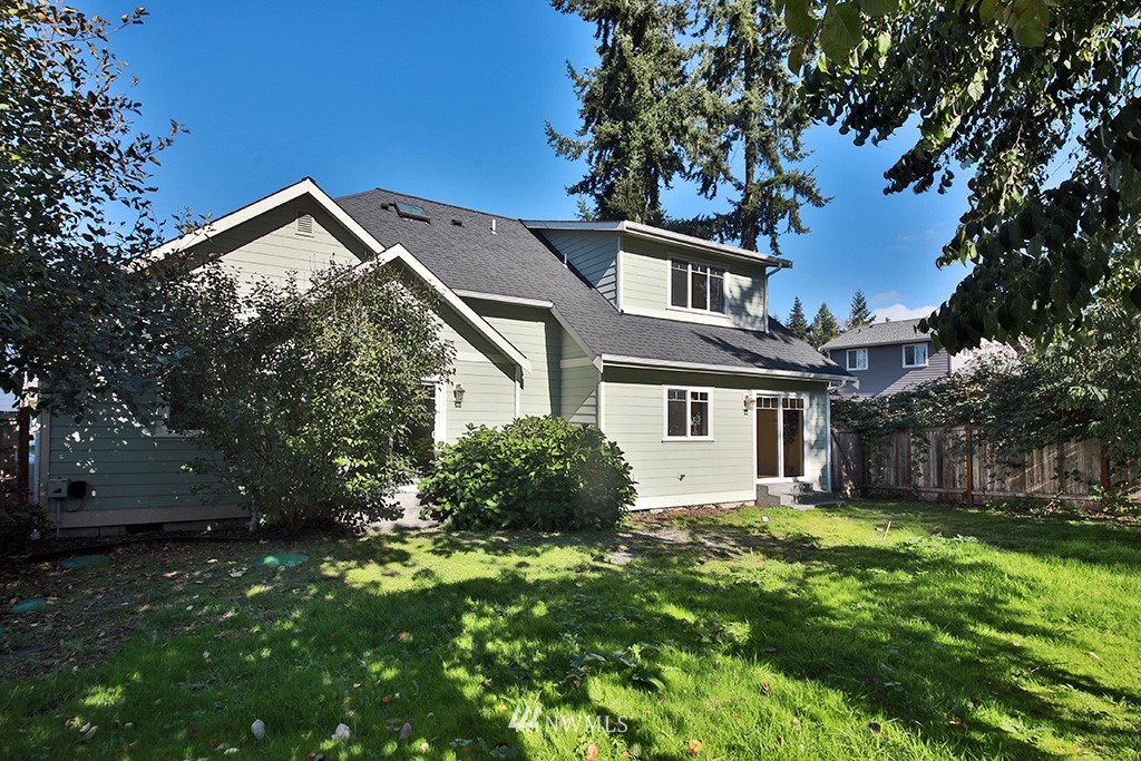 1822 East Watkins Road Freeland, WA 98249 - Photo 23 of 25 a view of a house with a yard