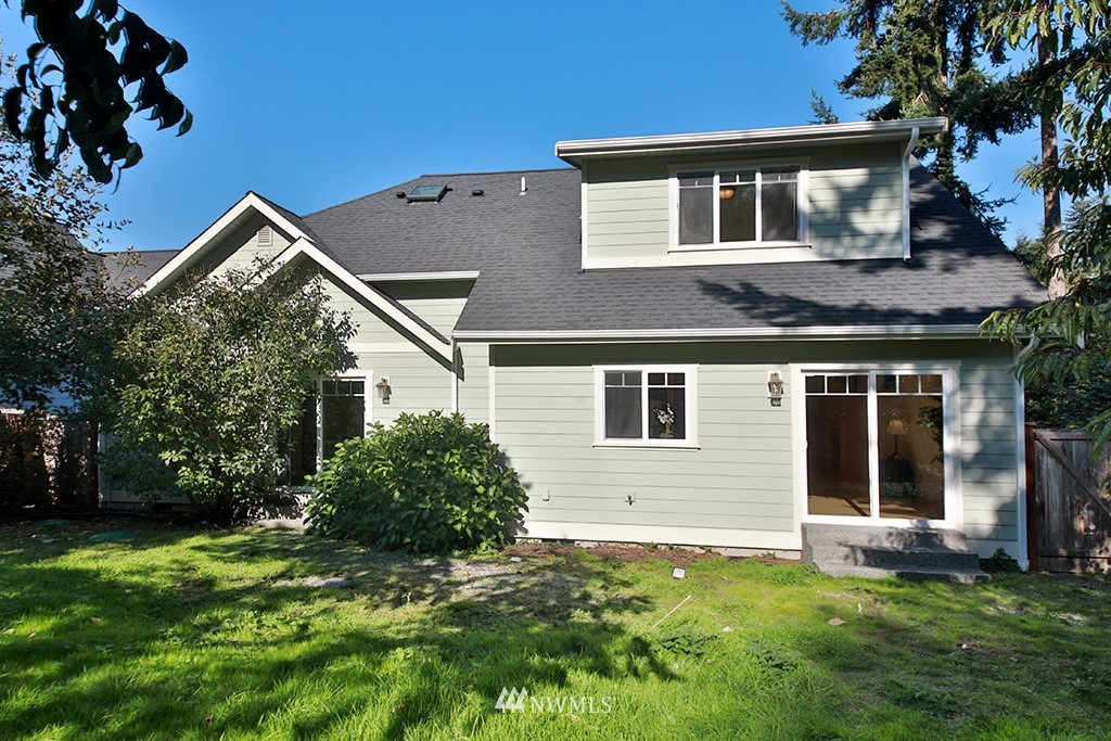 1822 East Watkins Road Freeland, WA 98249 - Photo 24 of 25 a front view of a house with a yard