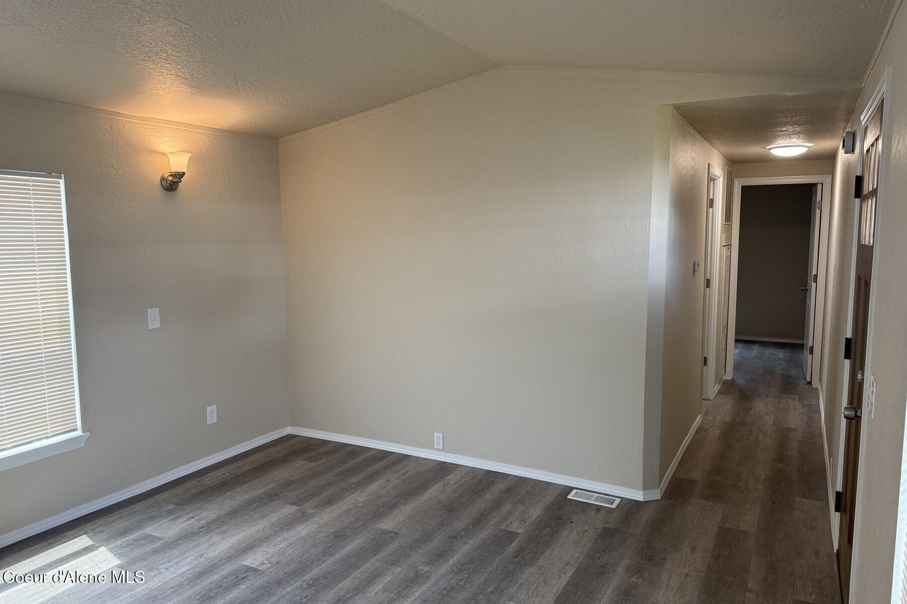 10734 North Benoit Street Hayden, ID 83835 - Photo 16 of 21 Living Room to Hallway