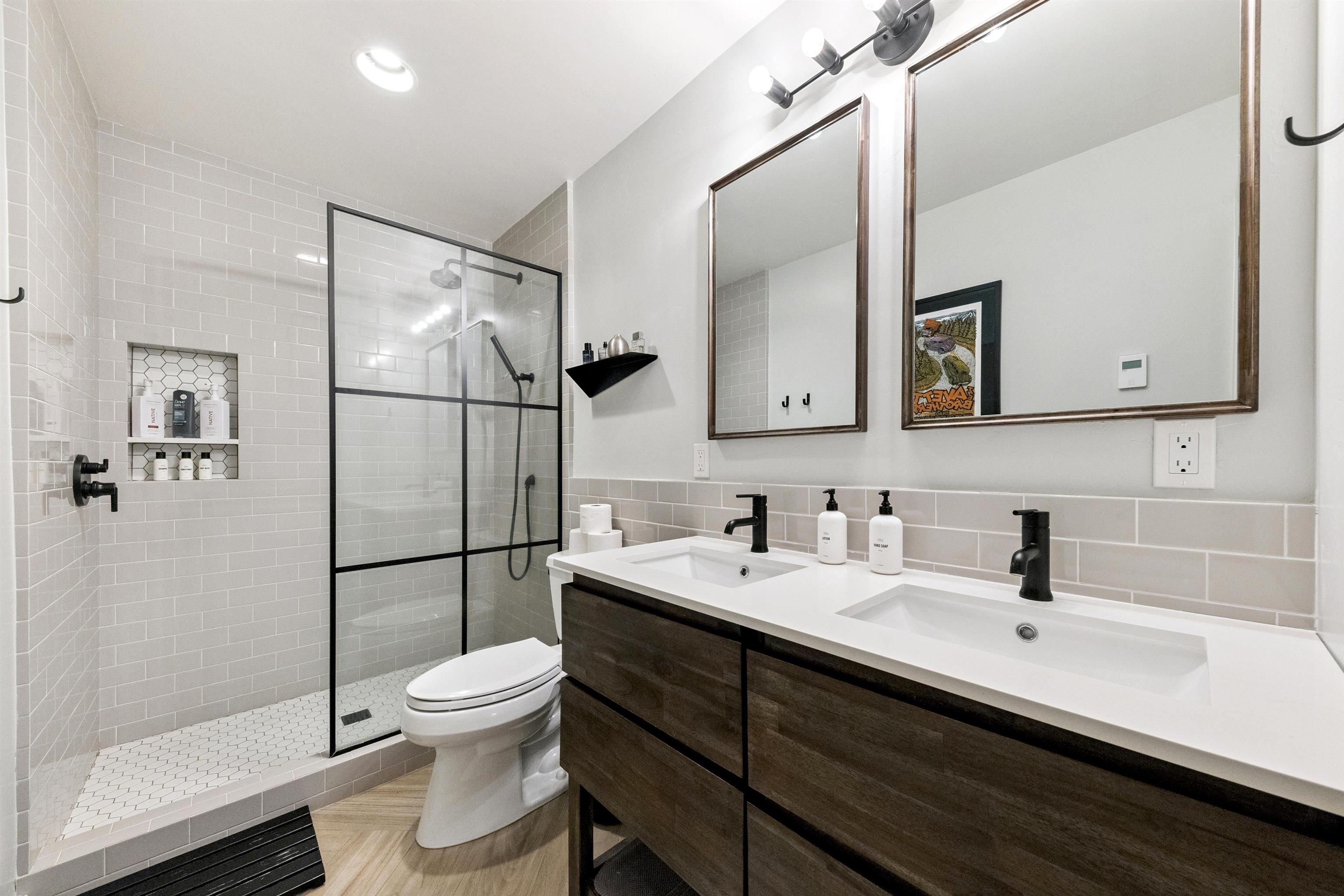15462 Donner Pass Road, Unit 30 Truckee, CA 96161 - Photo 2 of 28 a bathroom with a sink toilet and shower