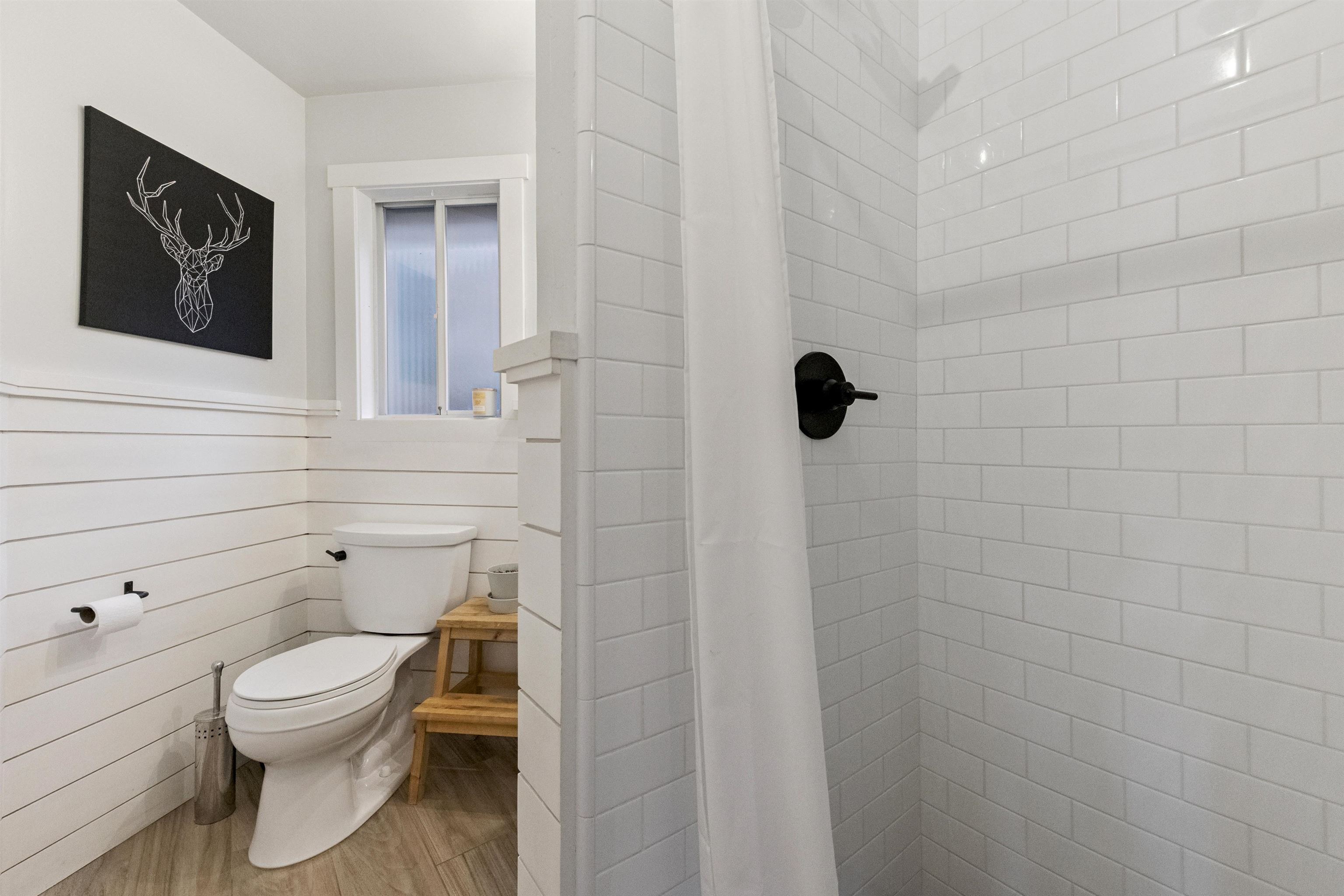 15462 Donner Pass Road, Unit 30 Truckee, CA 96161 - Photo 25 of 28 a bathroom with a toilet a sink and shower