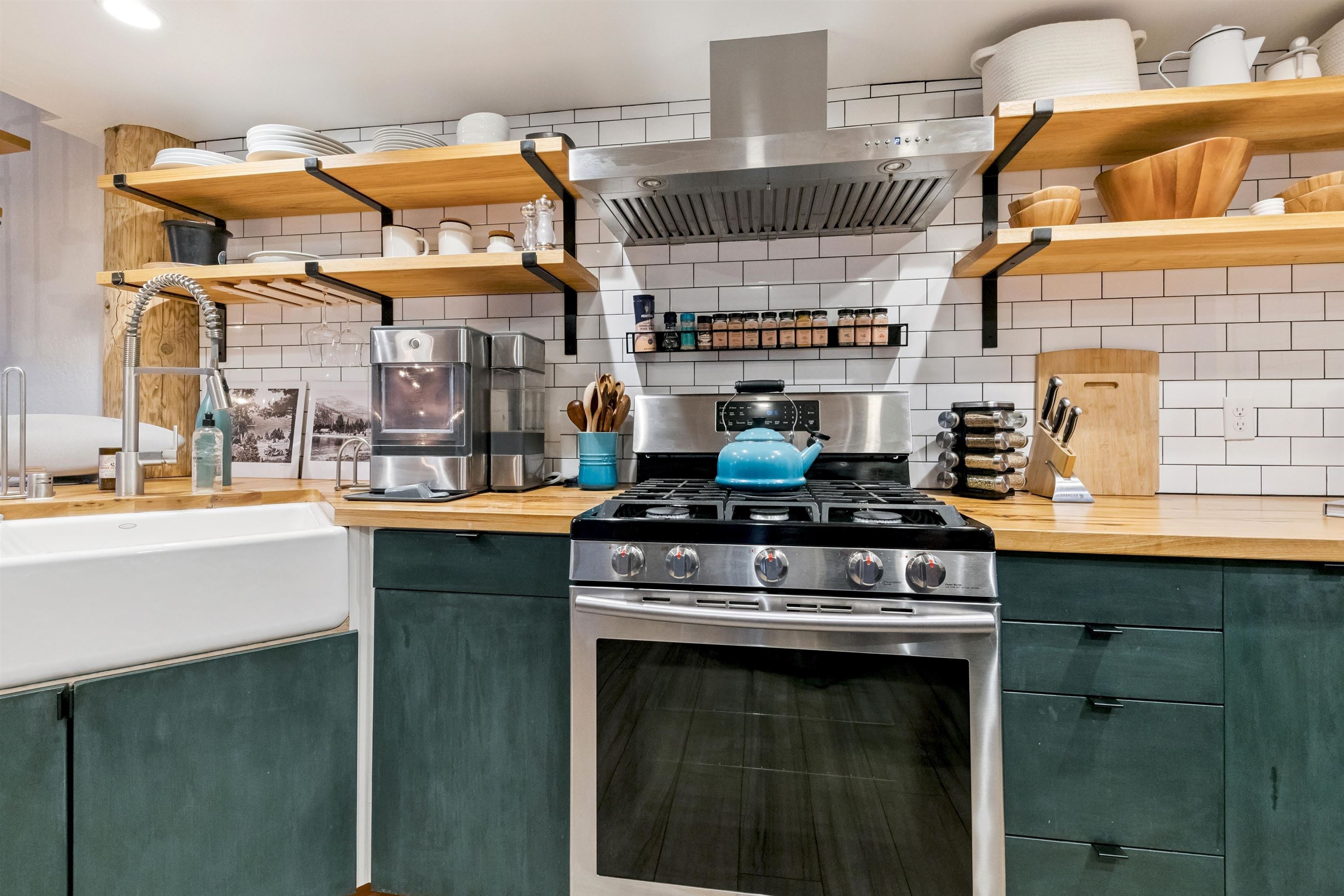 15462 Donner Pass Road, Unit 30 Truckee, CA 96161 - Photo 25 of 28 a kitchen with a stove and a sink