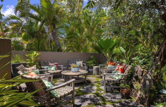 an outdoor space with furniture