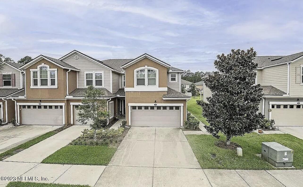 a house view with a garden space
