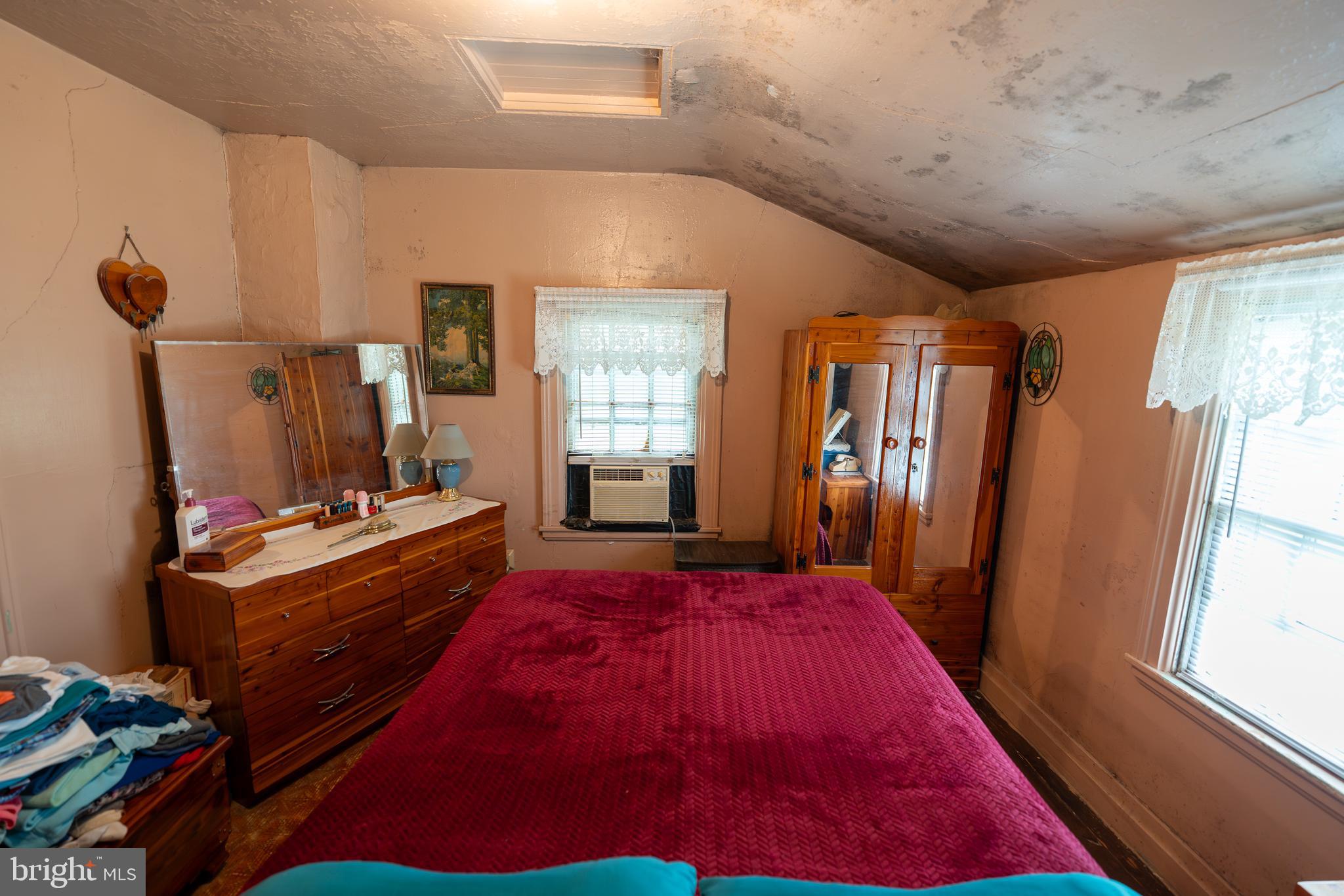 4520 Newark Road Cochranville, PA 19330 - Photo 13 of 24 a bed room with a bed and a window