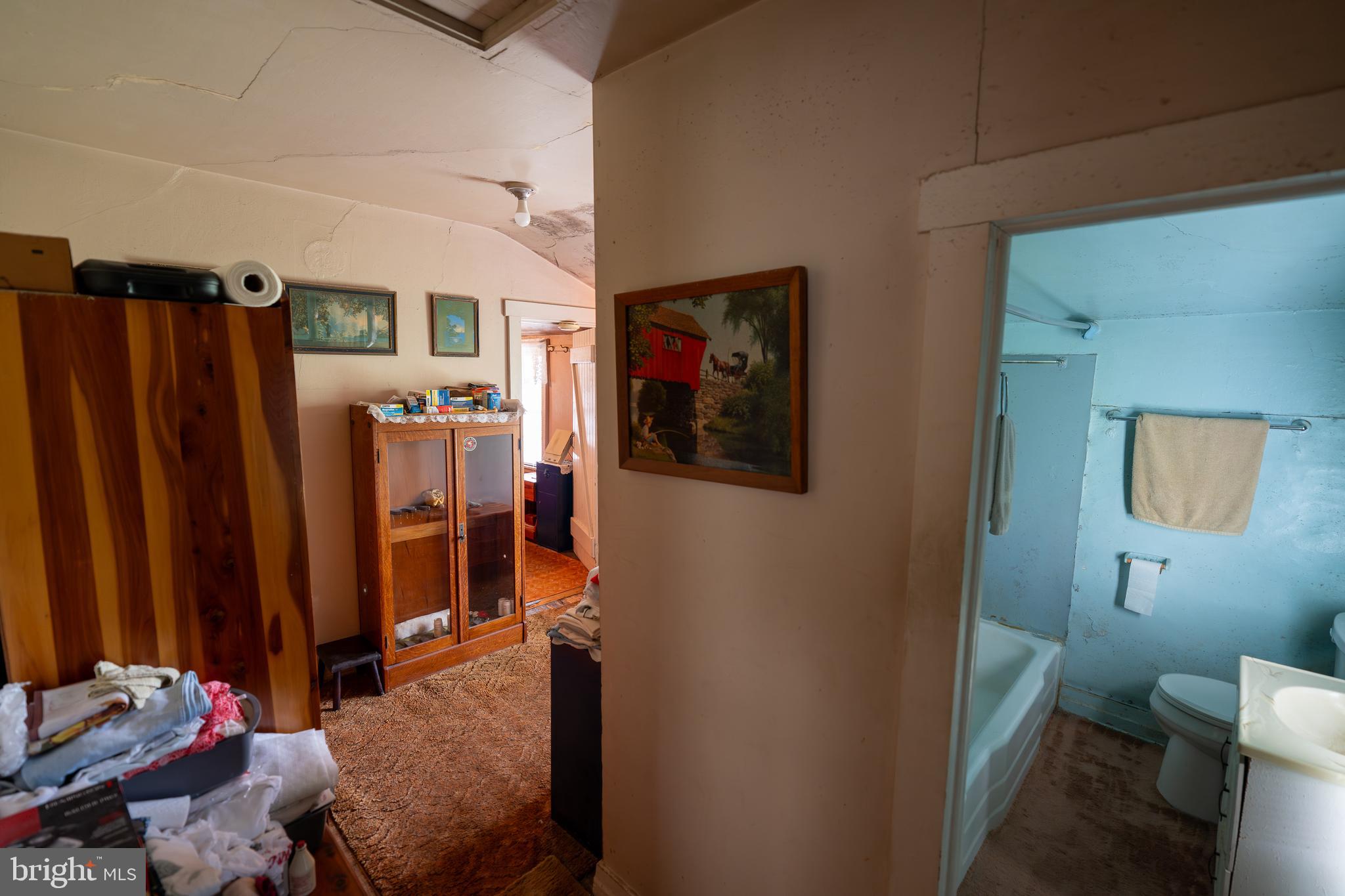 4520 Newark Road Cochranville, PA 19330 - Photo 15 of 24 a living room with furniture and a bathroom