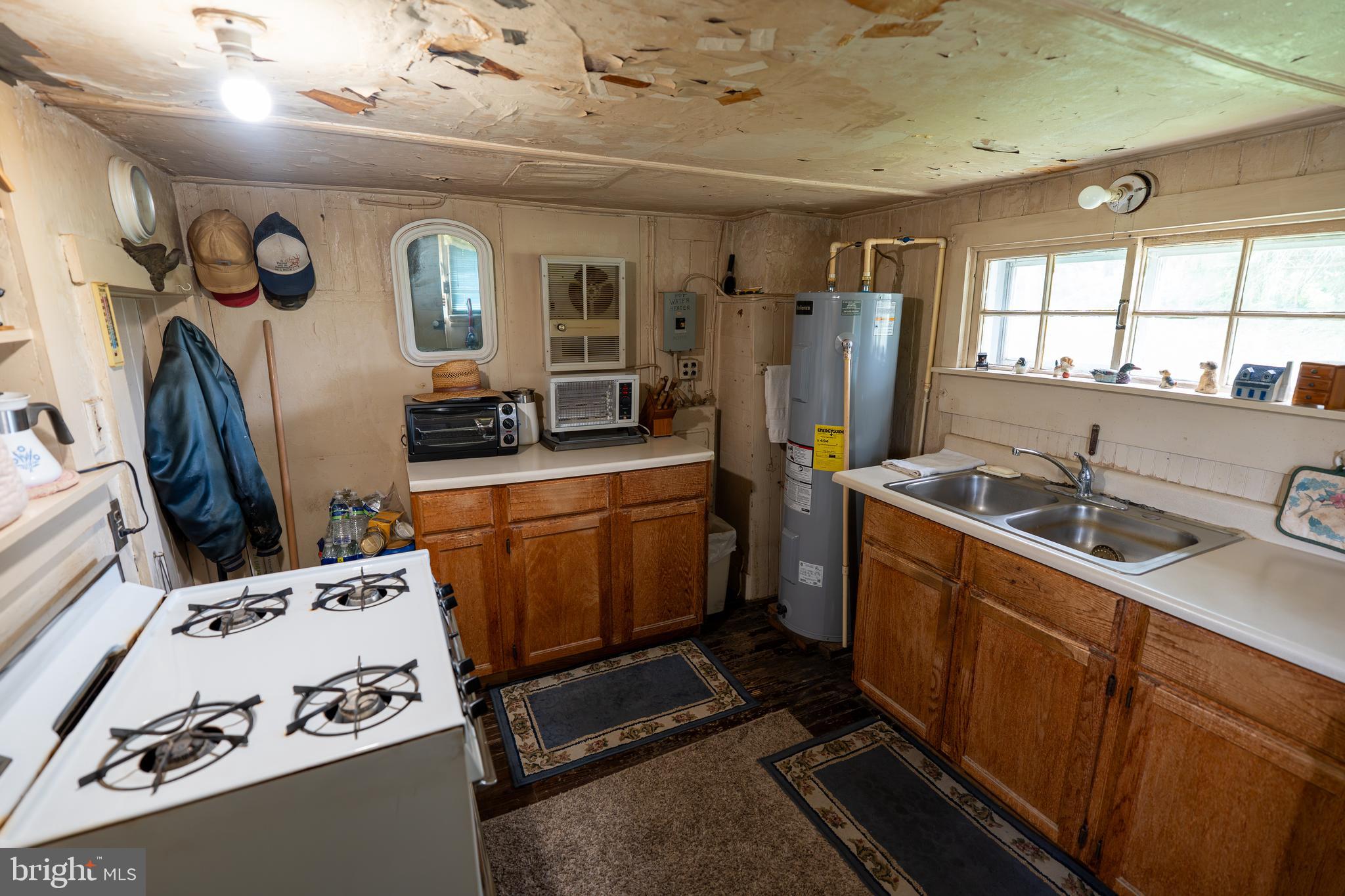 4520 Newark Road Cochranville, PA 19330 - Photo 5 of 24 a room with sink a washer dryer and washer