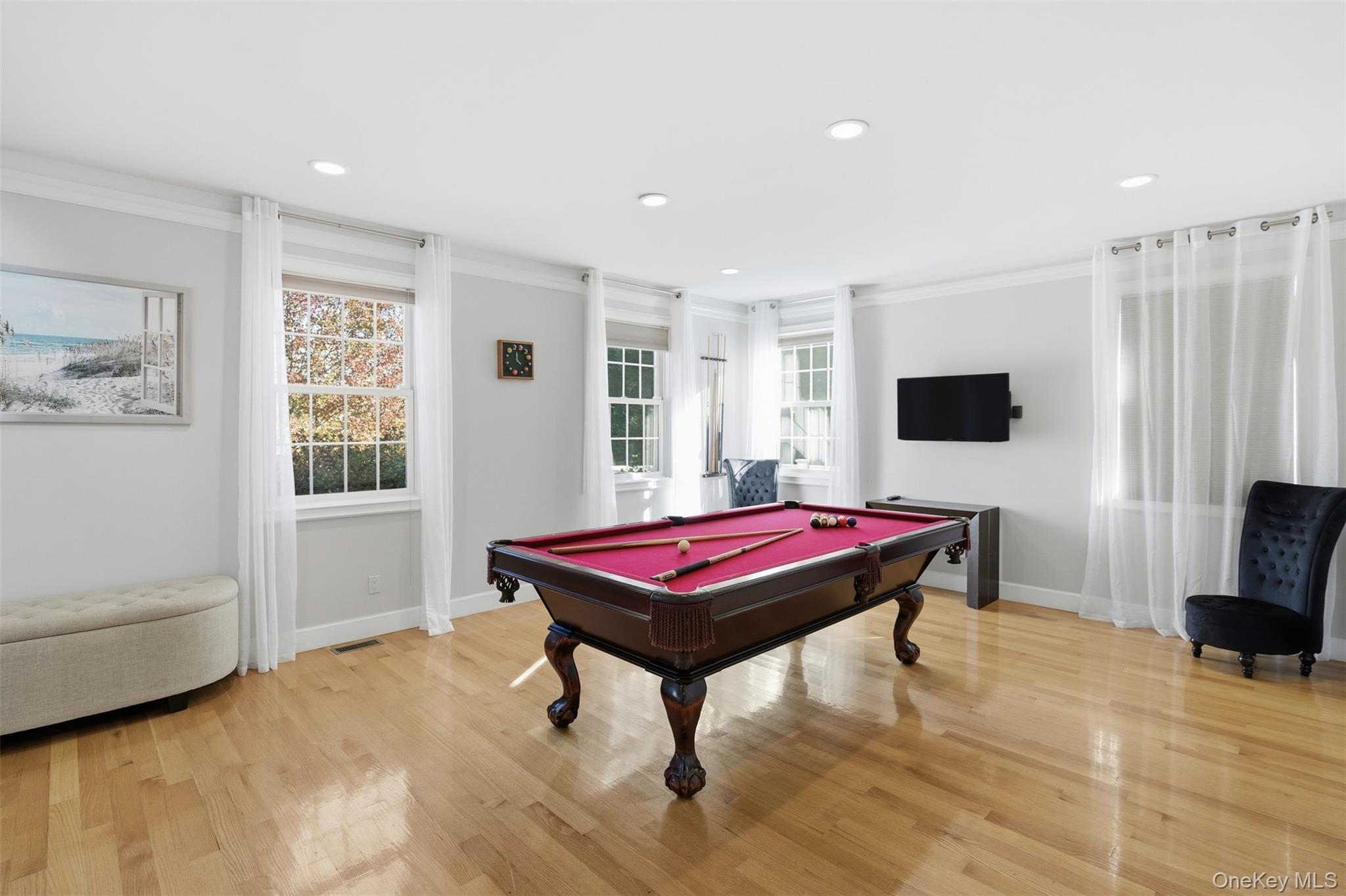 33 A Newtown Road Hampton Bays, NY 11946 - Photo 29 of 50 Rec room with billiards table, ornamental molding, light wood finished floors, and recessed lighting