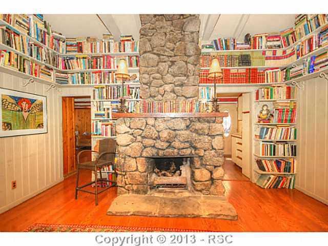 3890 Overlook Road Colorado Springs, CO 80906 - Photo 8 of 24 Charming original stone fireplace