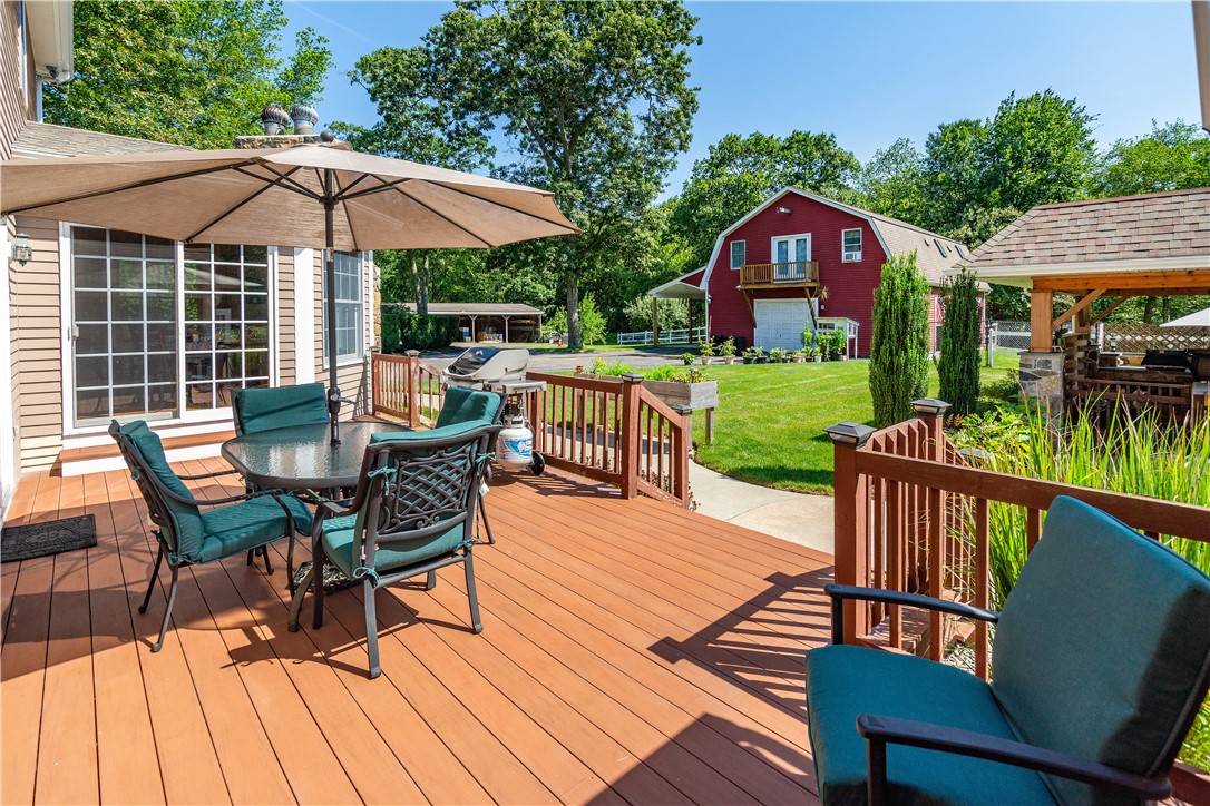 41 Edie's Lane Exeter, RI 02822 - Photo 21 of 50 Primary deck passage to pool