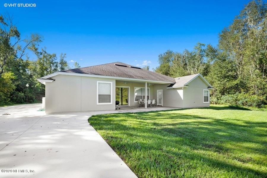 9253 Old Plank Road Jacksonville, FL 32220 - Photo 28 of 30 Backyard and large concrete driveway