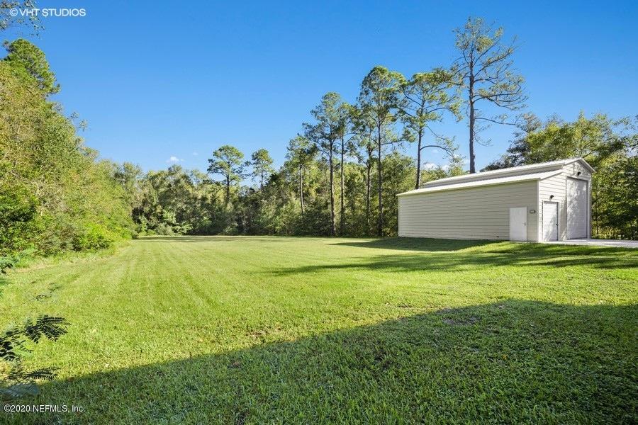 9253 Old Plank Road Jacksonville, FL 32220 - Photo 29 of 30 side view of detached garage