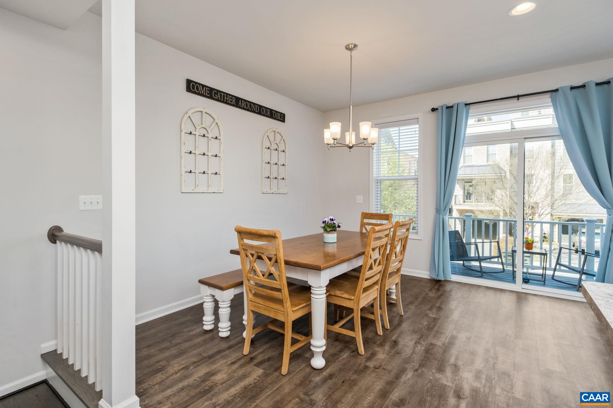 2720 Avinity Lane Charlottesville, VA 22902 - Photo 11 of 45 a view of a dining room with furniture wooden floor and chandelier