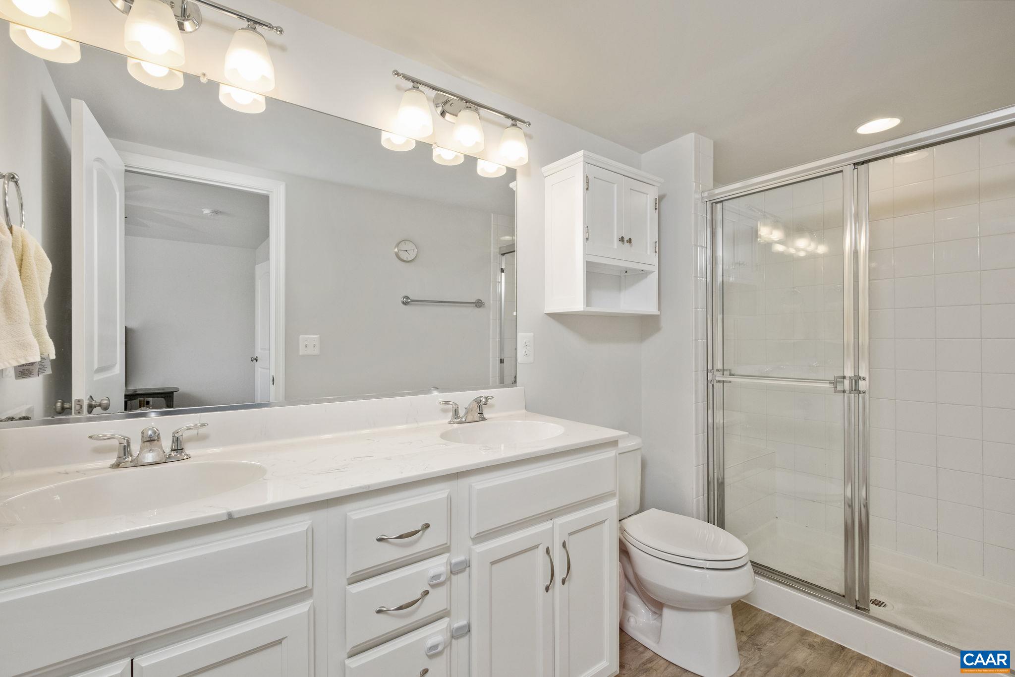 2720 Avinity Lane Charlottesville, VA 22902 - Photo 16 of 45 a bathroom with a double vanity sink mirror and toilet