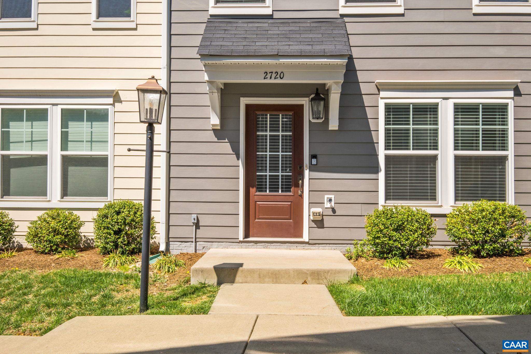 2720 Avinity Lane Charlottesville, VA 22902 - Photo 2 of 45 a front view of a house with garden