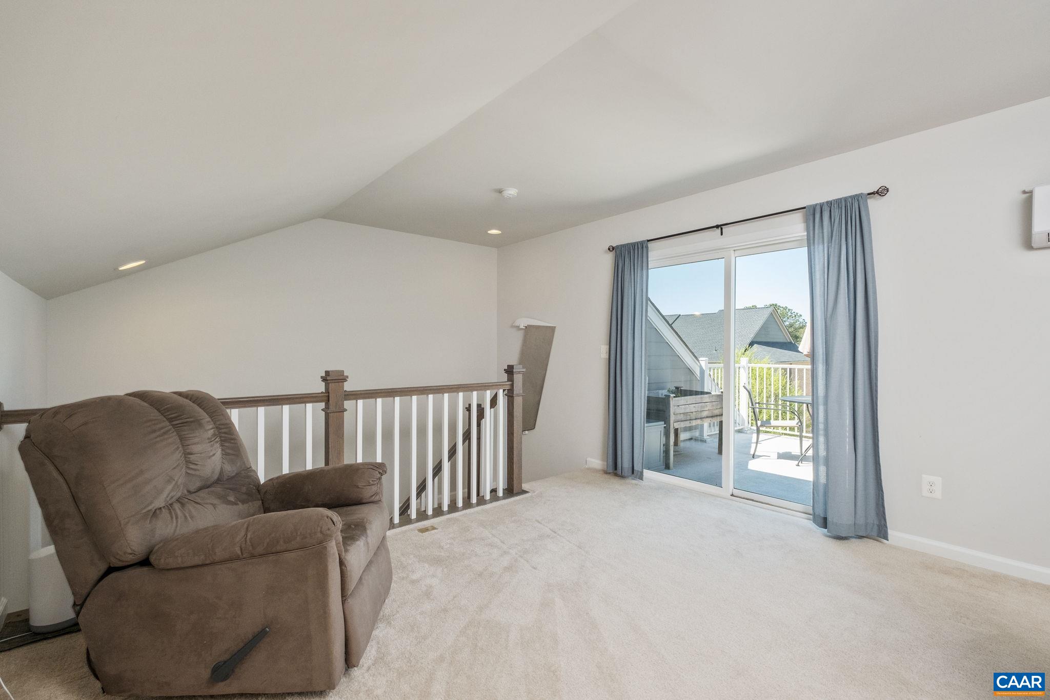 2720 Avinity Lane Charlottesville, VA 22902 - Photo 23 of 45 a living room with furniture and a window