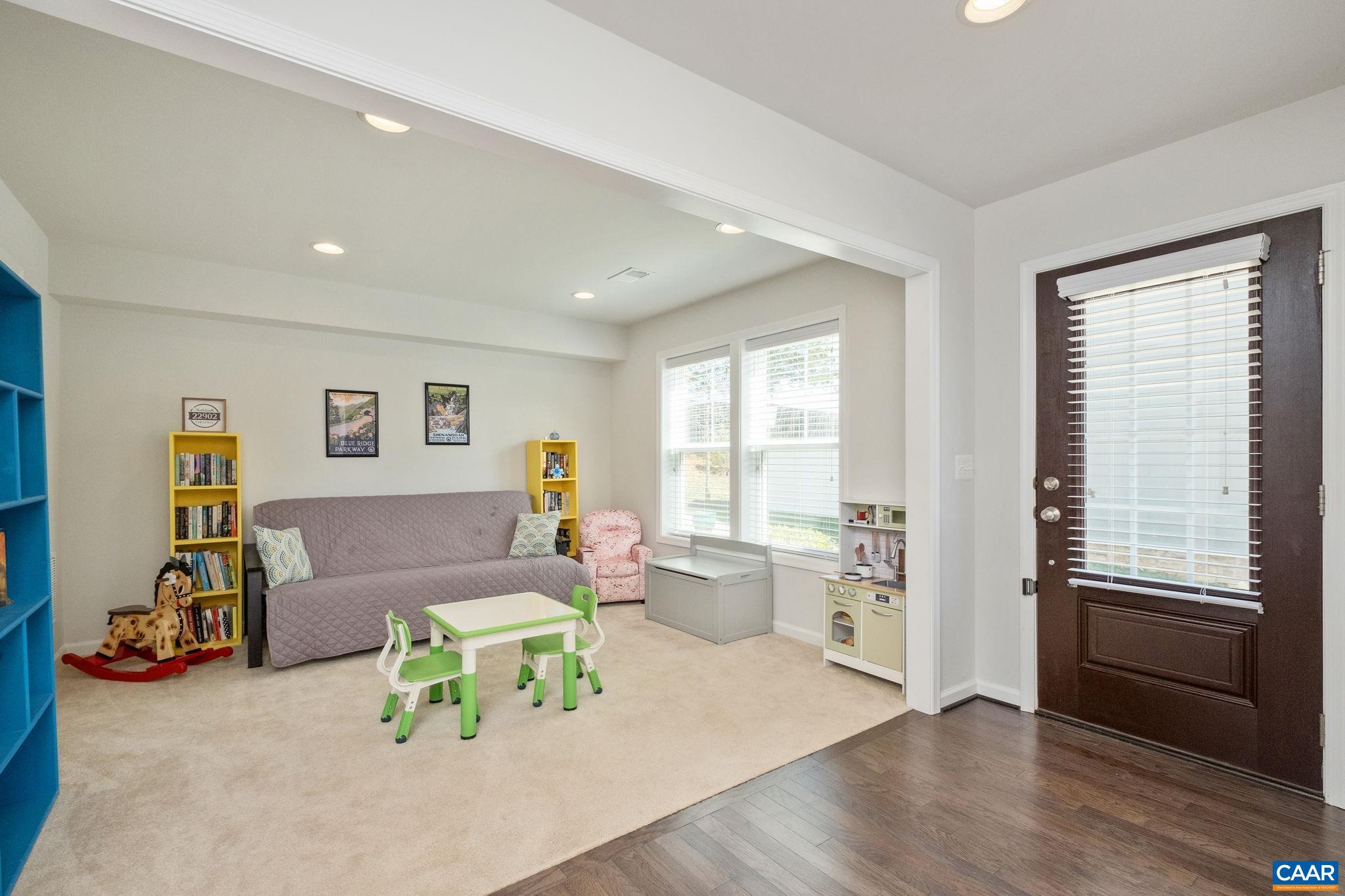 2720 Avinity Lane Charlottesville, VA 22902 - Photo 4 of 45 a living room with furniture and a wooden floor