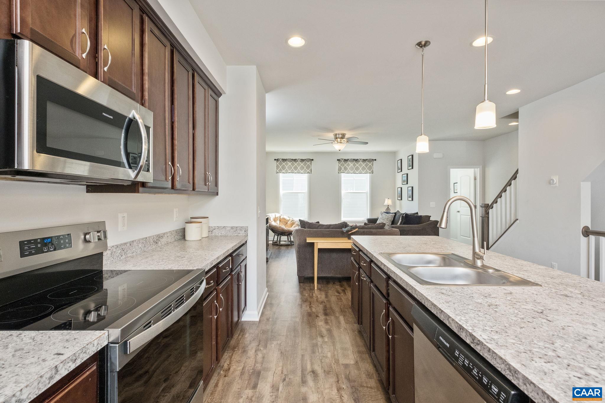 2720 Avinity Lane Charlottesville, VA 22902 - Photo 6 of 45 a kitchen with stainless steel appliances granite countertop counter space a sink and stove