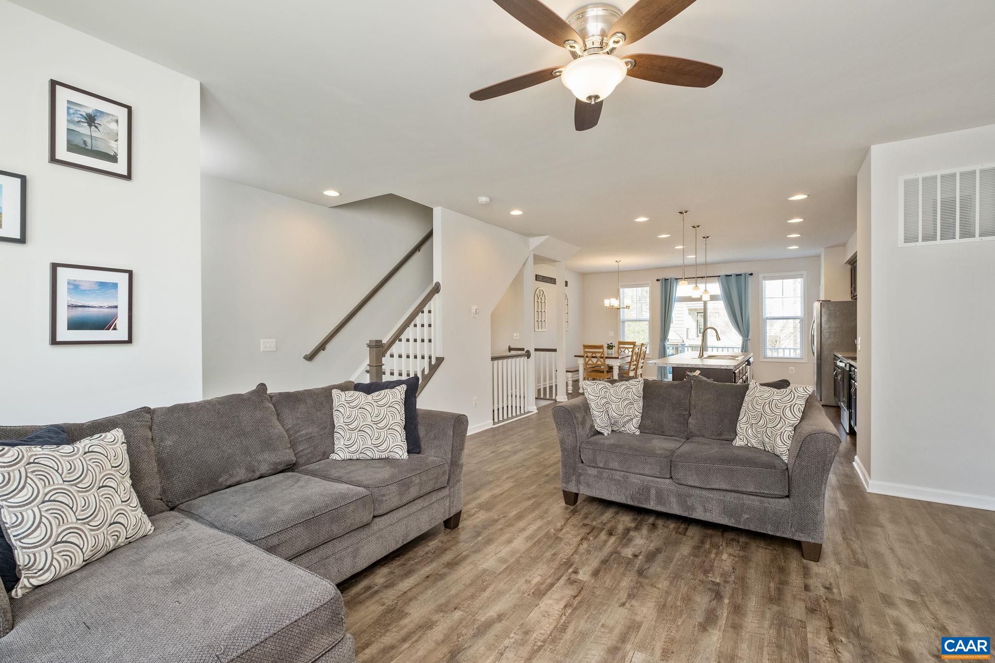 2720 Avinity Lane Charlottesville, VA 22902 - Photo 9 of 45 a living room with furniture and a wooden floor