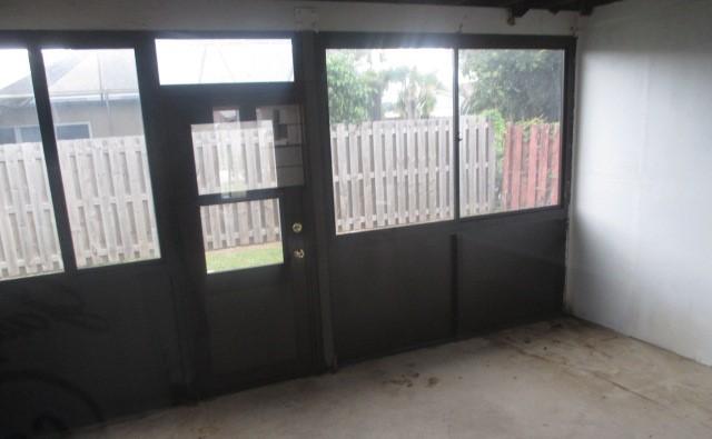 23097 Southwest 60th Way Boca Raton, FL 33428 - Photo 16 of 18 a view of an empty room and window