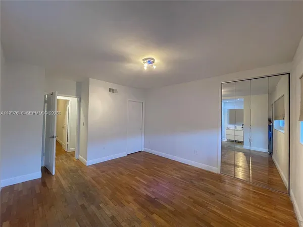 a view of a backyard of the house