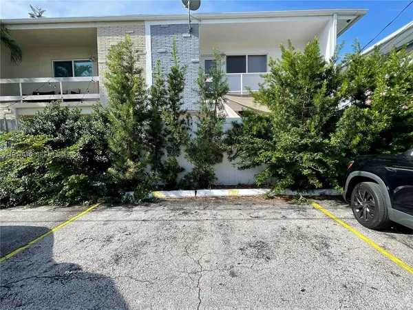 a view of a back yard of the house