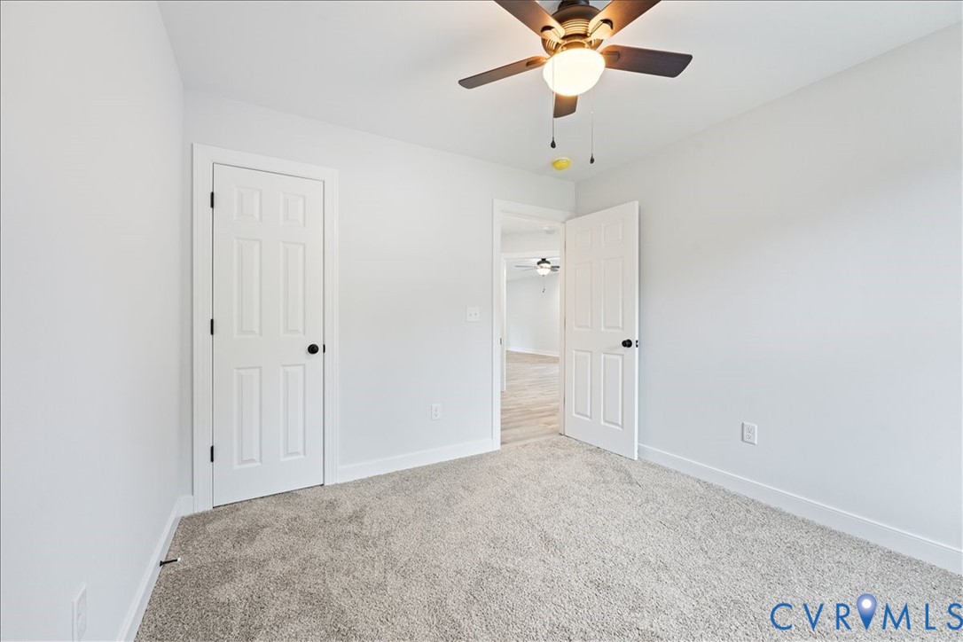 136 Gene Road Blackstone, VA 23824 - Photo 11 of 18 Unfurnished bedroom featuring carpet and ceiling f