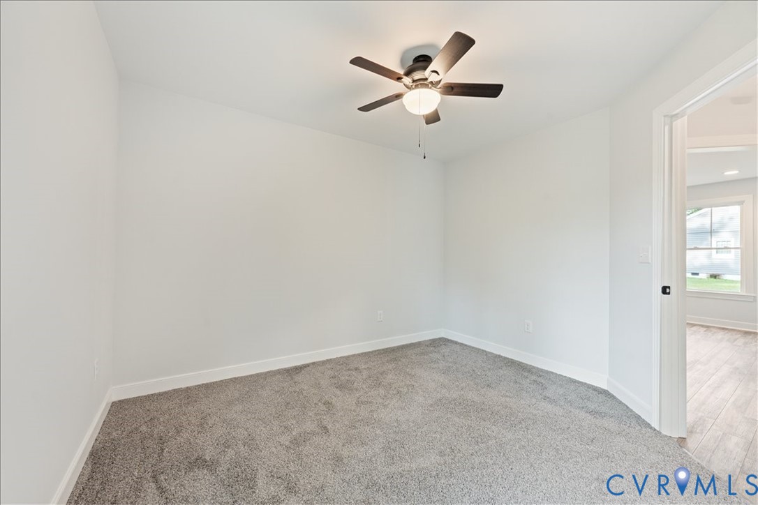 136 Gene Road Blackstone, VA 23824 - Photo 12 of 18 Spare room with light colored carpet and ceiling f