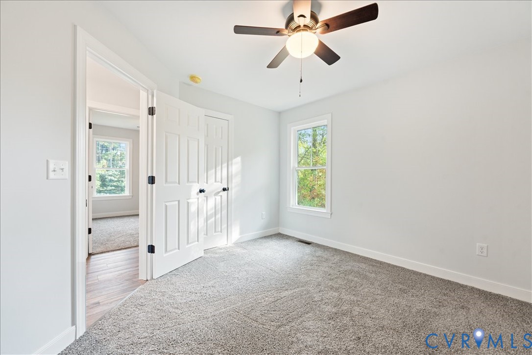 136 Gene Road Blackstone, VA 23824 - Photo 13 of 18 Unfurnished bedroom with carpet flooring and a cei