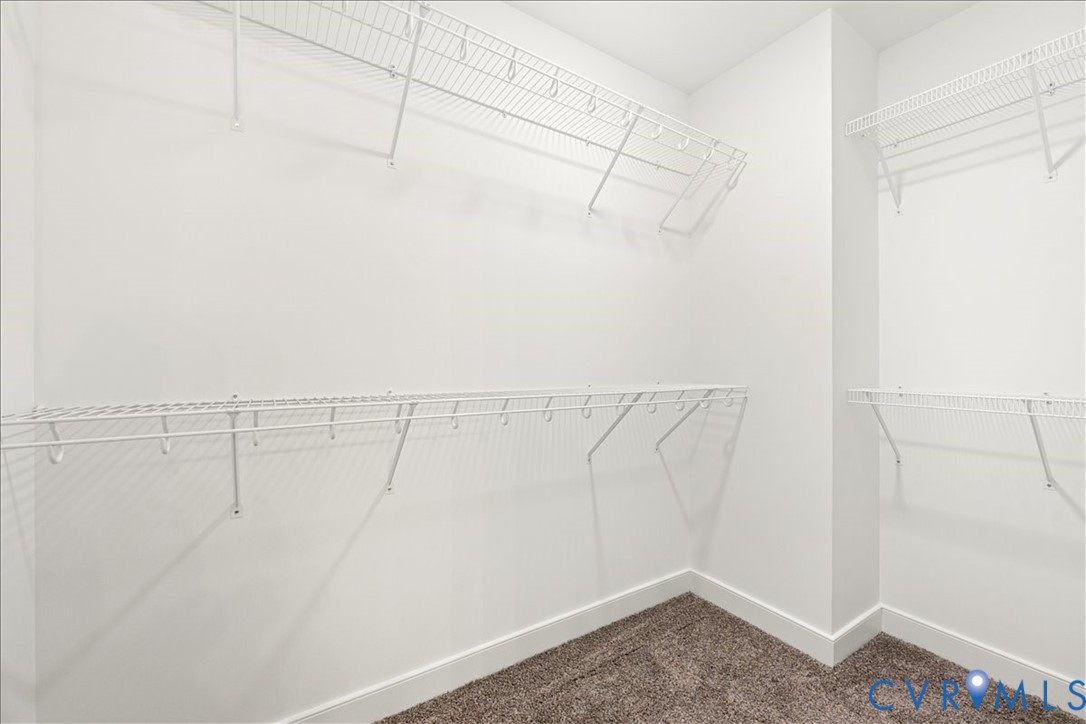 136 Gene Road Blackstone, VA 23824 - Photo 15 of 18 Walk in closet featuring dark carpet
