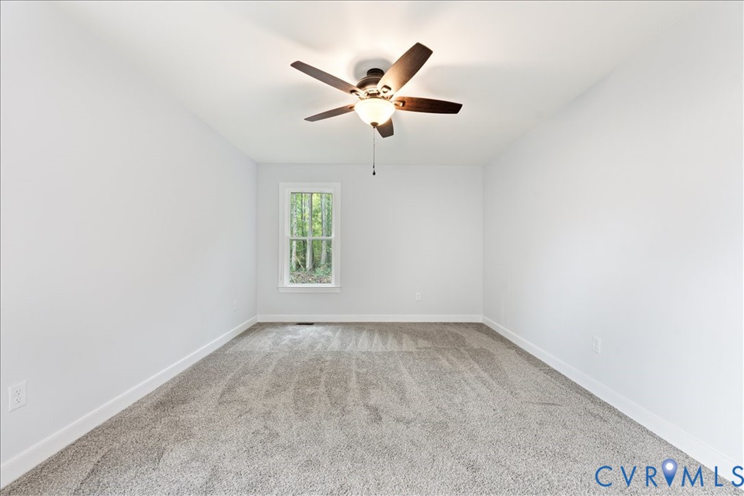 136 Gene Road Blackstone, VA 23824 - Photo 16 of 18 Unfurnished room with light colored carpet and a c