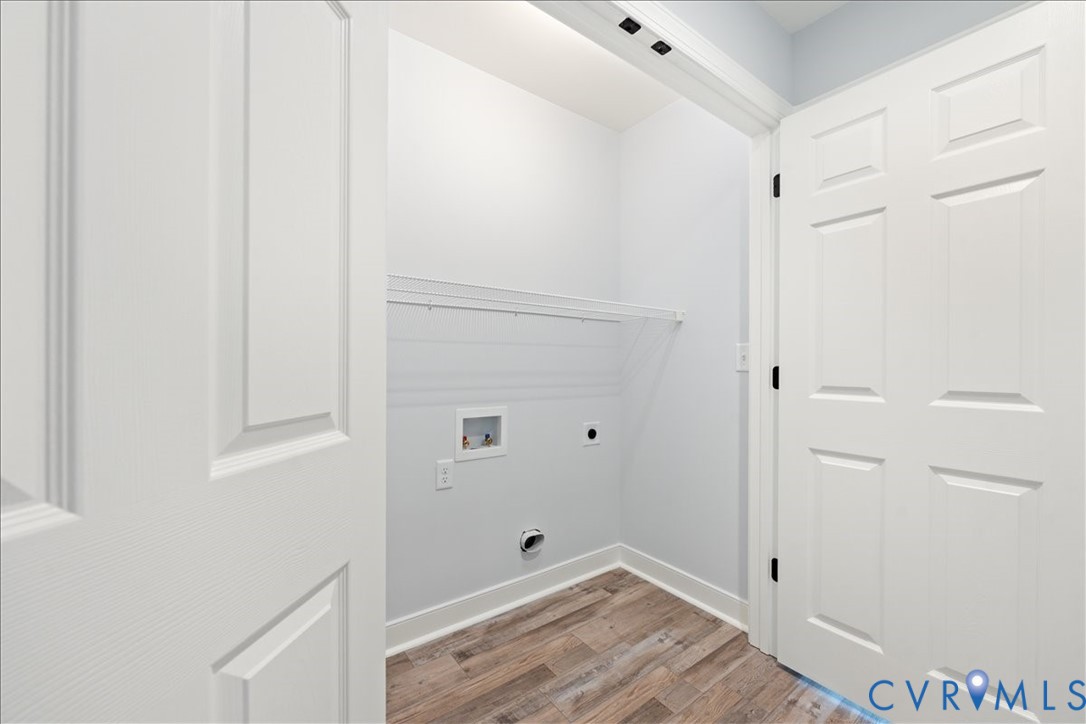 136 Gene Road Blackstone, VA 23824 - Photo 17 of 18 Laundry room with wood finished floors, hookup for