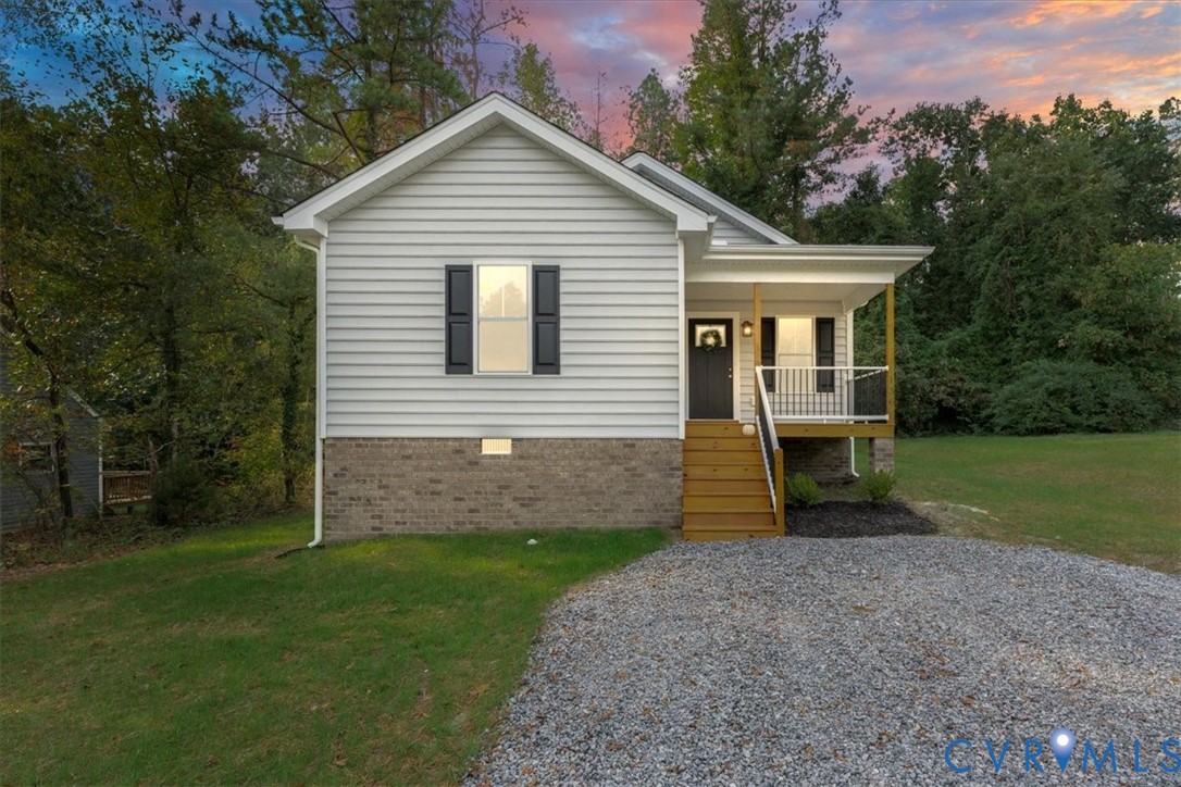 136 Gene Road Blackstone, VA 23824 - Photo 18 of 18 View of front of property with a lawn, a porch, st