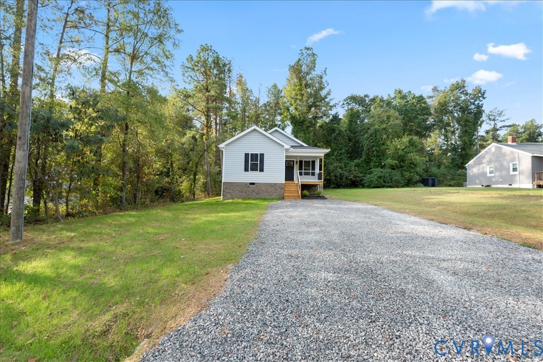 136 Gene Road Blackstone, VA 23824 - Photo 2 of 18 View of front of property with crawl space, a porc