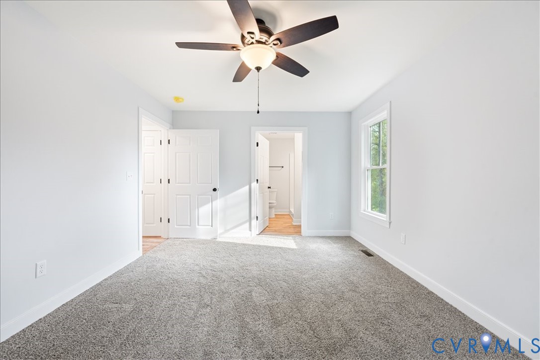 136 Gene Road Blackstone, VA 23824 - Photo 8 of 18 Unfurnished bedroom with light carpet, ceiling fan