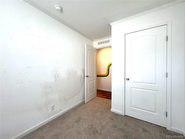 a view of a room with an empty space